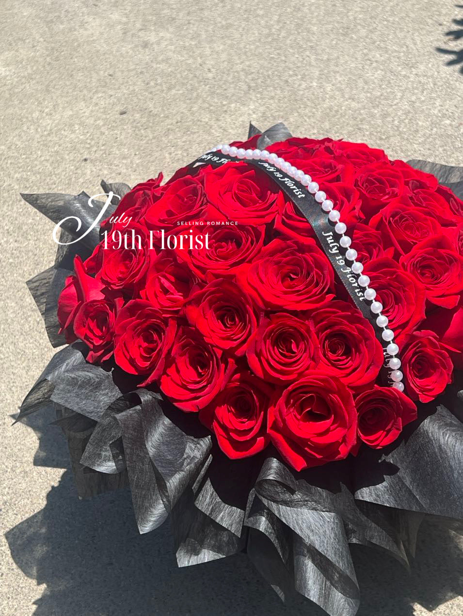 52 Red Roses Hug Bucket